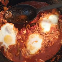 A picture of Ken's Authentic Shakshuka (Poached Eggs in Spicy Tomato Ragout).