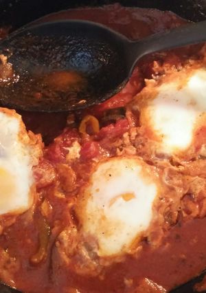 A picture of Ken's Authentic Shakshuka (Poached Eggs in Spicy Tomato Ragout).