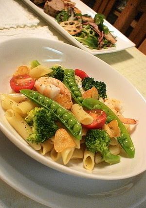 A picture of Penne with Spring Vegetables.