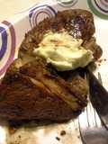 Grilled Chipotle-rubbed Steaks with Lime Butter