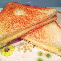 A picture of Complicated grill cheese sandwich.