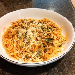 A picture of Angel Hair Pasta w/ Creamy Italian Sausage & Habanero Tomato Sauce.