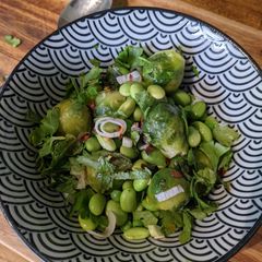 A picture of Super green Brussel sprout and Edamame salad for lunch.