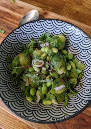 A picture of Super green Brussel sprout and Edamame salad for lunch.