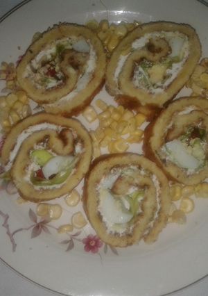 Una foto de Arrollado de choclo y merengue