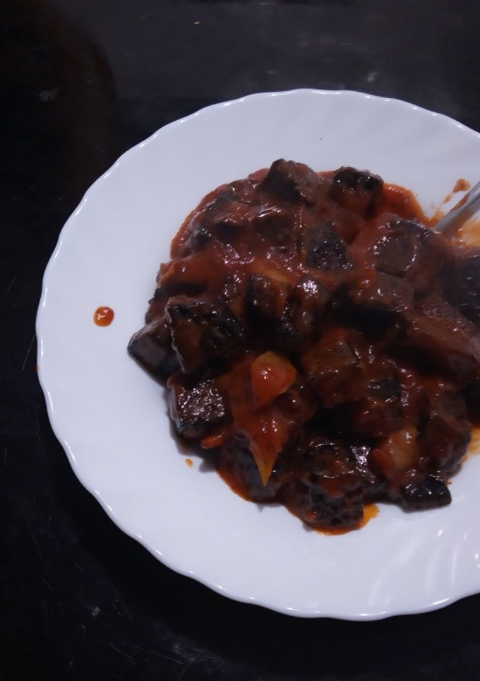 Una foto de Sangre con tomate