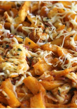 Una foto de Patatas especiadas con bacon y queso
