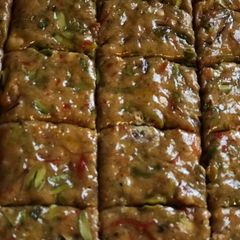 A picture of Walnut, pistachios and Pecan nut chikki.