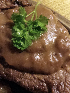 A picture of Beef filet steak and black pepper sauce.