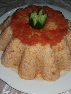 صورة لوصفة رز بالبندورة ولا اطيب