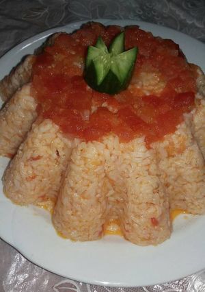 صورة لوصفة رز بالبندورة ولا اطيب