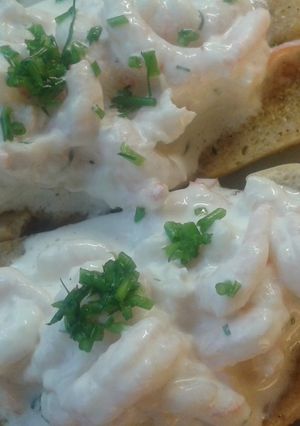 A picture of Swedish shrimp on garlic bread.