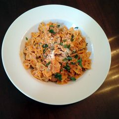 A picture of Bow Ties with sausage tomatoes and cream.