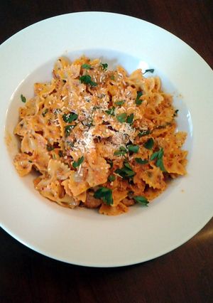 A picture of Bow Ties with sausage tomatoes and cream.