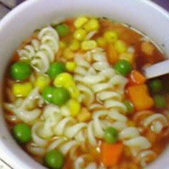 A picture of Consomme Soup with Macaroni.