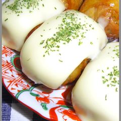 A picture of Wrapped Onigiri Topped With Cheese!.