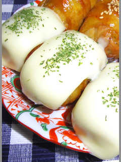A picture of Wrapped Onigiri Topped With Cheese!.