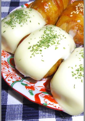 A picture of Wrapped Onigiri Topped With Cheese!.