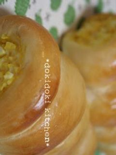A picture of Cornets From a Bread Machine With Lots of Egg Salad Filling.