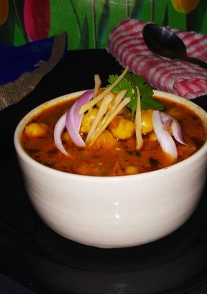 A picture of Tomato Chhole.