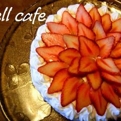 A picture of A Strawberry Cake Decorated like a Flower.