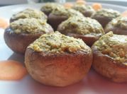 A picture of champignons with vegetable filling
