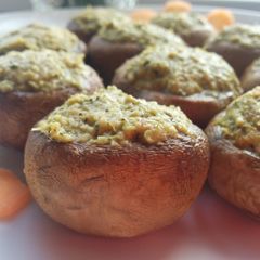 A picture of Champignons with vegetable filling.