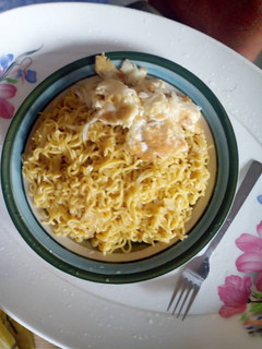A picture of Noddles and fried egg.