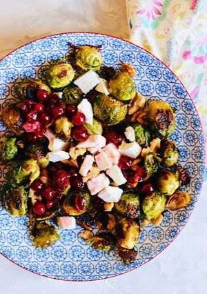 A picture of Salad with brussels sprouts and feta cheese in cranberry sauce 🥗.