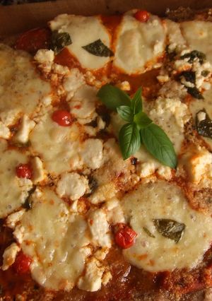 Una foto de Pizza con masa integral
