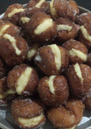 Una foto de Bolitas de fraile con crema pastelera