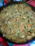 Paella de arroz, mejillones y langostinos