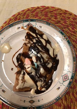 Una foto de Crepas Dulces de Chocolate rellenas de fresas