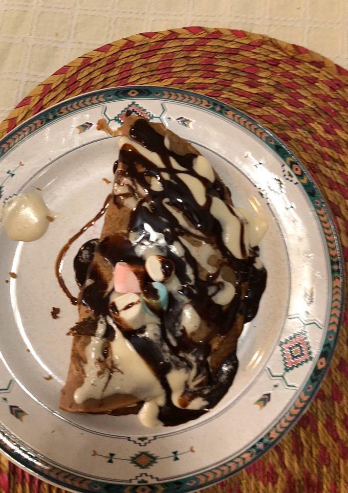 Una foto de Crepas Dulces de Chocolate rellenas de fresas