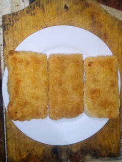 Una foto de Milanesa de jamón, queso y zapallitos