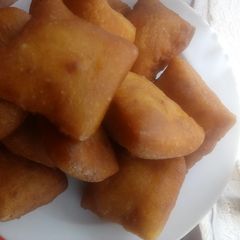 A picture of Turmeric coconut mandazis.