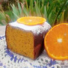 Una foto de Budín de mandarina y amapola