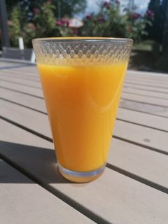 Une photo de Jus orange mangue