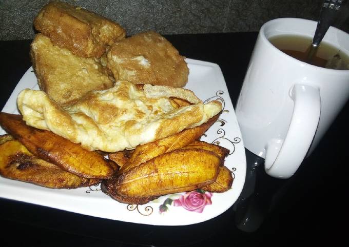 Plantain, bread in egg,egg with Tea