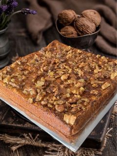 A picture of Oat Cake with Walnuts, Apples, and Carrots.