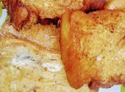 A picture of bread with fried eggs