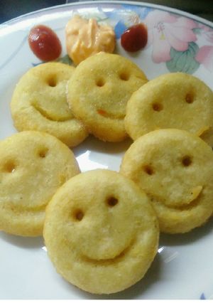 A picture of Homemade Potato Smiley Faces.