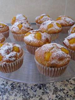 Una foto de Magdalenas de arándanos con crema de mango