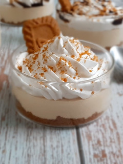 A picture of Lotus Biscoff with Salted Caramel Mousse and Whipped Cream.