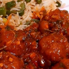 A picture of Spicy Manchurian with Rice.