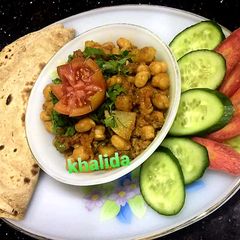 A picture of 3 spices mince potatoes chickpeas.