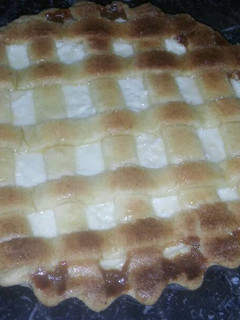 Una foto de Torta de ricota y dulce de leche