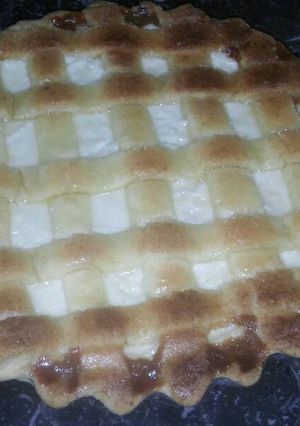 Una foto de Torta de ricota y dulce de leche