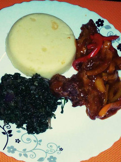 A picture of Fajita pork strips served with Buttered mashed potatoes and Stir Fried Spinach.