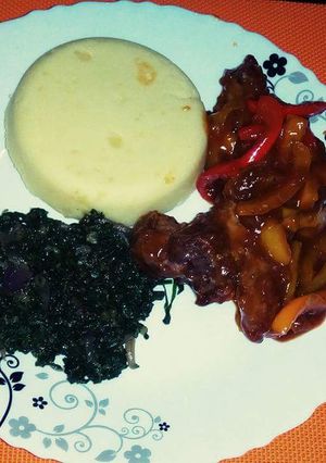 A picture of Fajita pork strips served with Buttered mashed potatoes and Stir Fried Spinach.